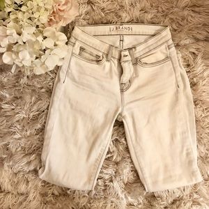 White high waisted jeans with a stiletto cut